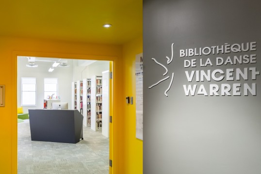 Lobby of the bibliothèque de la danse Vincent-Warren with logo